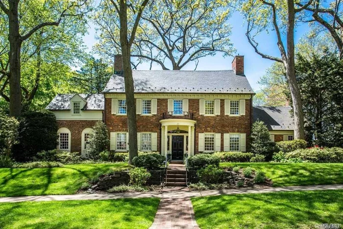 One of the most elegant & beautiful brick Georgian Colonial homes in Munsey Park. Exceptional architectural period details thru out this 5 bedroom home. Spacious yet warm & inviting entertaining rooms include a cozy knotty pine paneled Library, Lovely Living Rm w fpl, stylish den which overlooks the patio & gardens, & a formal DR which flows into the butlers pantry, kitchen & breakfast room.