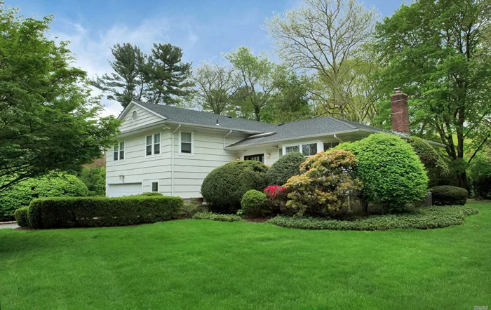 Fabulous location in East Hills. This home offers .42 acres of lush manicured landscaping. 4 bedrooms, 3 bathrooms. Updated EIK with stainless steel appliances. Sun lit living room and dining room. Flat usable property. Fueled by gas. Includes membership to East Hills Park.