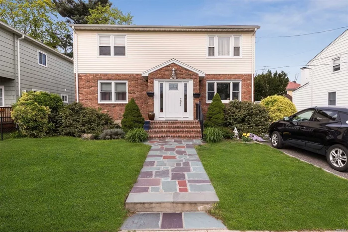 Legal 2-fam. w/a fenced yard in desirable Manorhaven Village. Stunning 1st flr has hdwd flrs, large living rm. Ample stor. in this modern EIK w/granite cntp, s/s appl & subway-tiled bkspl. 2 bdrms, pristine full bth. Upstrs unit has spacious living rm. w/sunny oversized kit w/dining area, 2 bdrms & full bth. LL has lrg rec room w/space for offc, playroom, full bth, stor/util. Separate meters, 2 burners, Ose. Close to rest, schls, shop, LIRR. Low taxes.