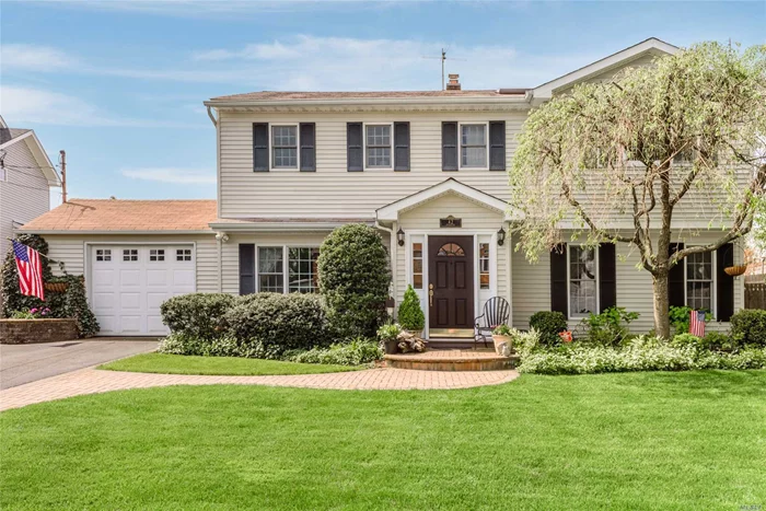 N. Syosset. Pristine and perfect classic 4 bedroom 2 full bath colonial situated mid block on a beautiful tree - lined street. An absolute 10 for curb appeal with classic lines and gorgeous landscaping. Loaded. Close to Village of Syosset, LIRR and Syosset schools.