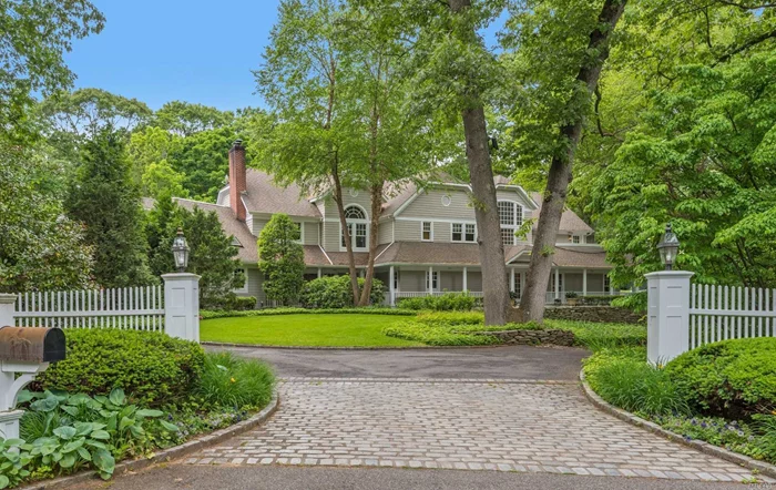 Center Hall Colonial expanded & rebuilt with the finest in detail & design. Dramatic two story entry introduces generous principal rooms where family and friends will gather. Highlights include a European-like master suite, paneled library, sun room, indoor sports court and home theater.  Award winning gardens enhance the picturesq two acres setting. Covered wrap around porch, pool, spa and tennis. Equestrian Paradise with easy access to the trails & preserve. Four-car garage. Jericho SD.