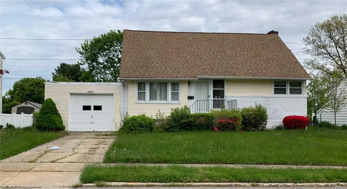 Great Opportunity to be in Syosset, Syosset Schools! Minutes to Train, Schools, & Shopping! Centrally located w/ great property. Make this one your own! Sold As Is!