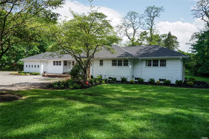 Tucked away in the Heart of Lattingtown. Set on a Private 4.29 Acres. This Country Home offers Bucolic Views From Every Room. Perfect for Weekends or Year Round, The 4/5 Bedroom Ranch is Ideal For Entertaining with French Doors From Living Roomand Dining Room that Open to the Romantic Vine Covered Brick Terrace with Expansive Views.