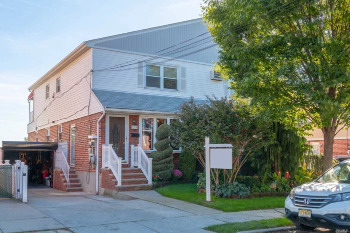 Semi-Detached Brick Two Family With Spectacular Water Views Of Powells Cove, Malba, And The Whitestone Bridge. Five Rooms Over Six Rooms And A Full Basement. Gorgeous Backyard And Landscaping. Private Driveway With Covered Parking.