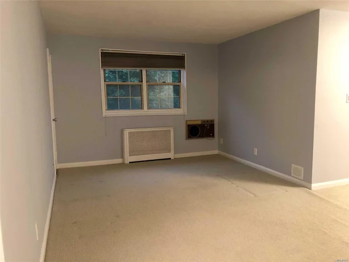 Newly Listed in Hollis Court! True Spacious Sunny Corner Unit Boasts Brand New Coat Of Paint, Freshly Shampooed Carpets, New Dimmers, & New Air Conditioner. Updated Kitchen, Clean Bathrom, Attic. Near Schools, Shops, & Transportation.