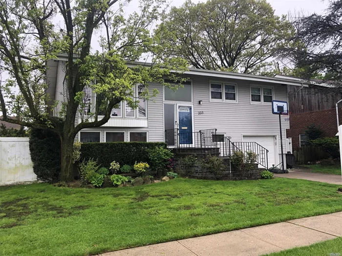 Beautifully Maintained 4BR Home. Features EIK W/Updated Appliances, Lg Deck Off Kitchen, Gas Heat, CAC, Alarm, IGS, HW Floors, New Roof, New Washer/Dryer, LR, DR With Vaulted Ceilings.