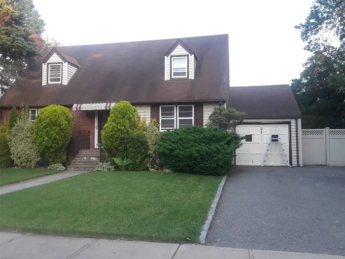 Oversized cape on oversized lot. Featuring 4 huge bedrooms, 3 full baths with updates, full finished basement with outside entrance: play room and family room, hardwood floors throughout. Ready to move in. No smoking & no pets allowed