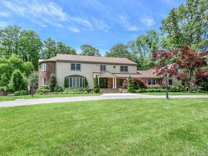 From the lushly landscaped private 2 acre grounds to the spacious and sun-drenched rooms, this majestic home is elegantly appointed for entertaining. The Entry Foyer with grand staircase and gold inlay floor will lead your guests to the sophisticated upper level. The Den and Florida Room, share a fireplace, The professional-grade EIK is fully equipped with high-end appliances. See attached sheet for specific details.