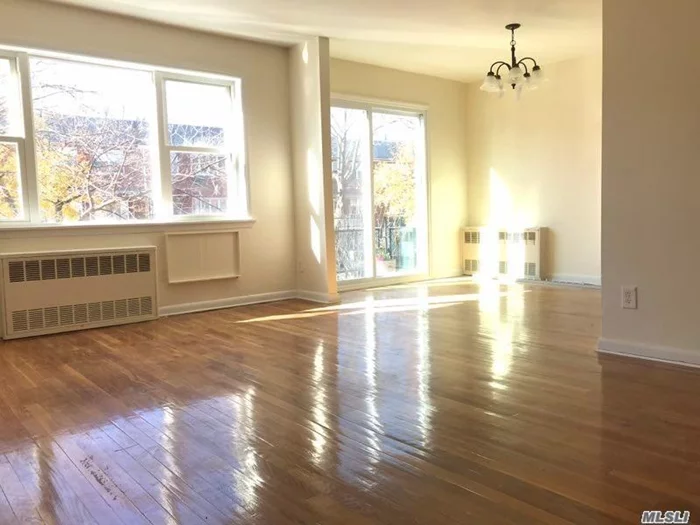 **Available** **All Utilities Included Except Electricity** Beautiful & Spacious 2 Bed Room Apartment Featured With New Windows & Updated Kitchen. One Block Away From P.S. 046 Alley Pond. Walking Distance To J.H.S. 074 Nathaniel Hawthorne & Benjamin Cardozo High School. One Parking Spot Included.