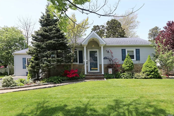 Welcome home to this beautiful expanded ranch in Nassau Shores. This home has tons of storage, and an updated Eat in kitchen with granite counters & stainless steel appliances. Updated bath, large living room w/fireplace add to the allure. The home also features a spacious dining room, & den w/sliders to the backyard. Beautiful country club backyard (fenced) with deck for entertaining. Updated roof/siding. Minutes to the Peninsula Golf Club. LOW TAXES--won&rsquo;t last!!