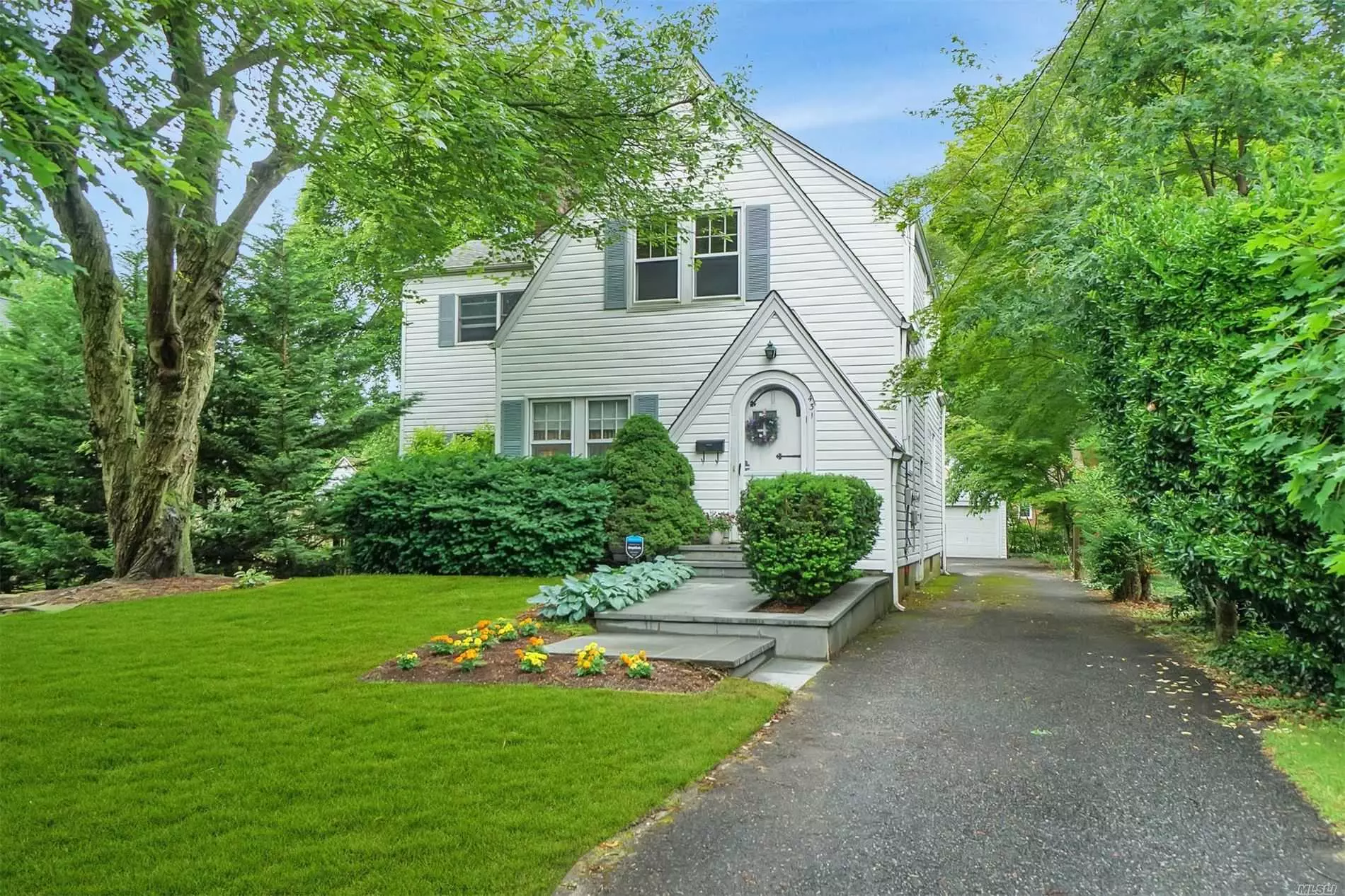 Beautiful Village Colonial Circa 1908 featuring New Kitchen, Formal Living Room with Fireplace, Den, master Bedroom with Bath, Full Dry Basement, Detached 2 car garage on 72X150 Lot!- This is the one you have been waiting for!-