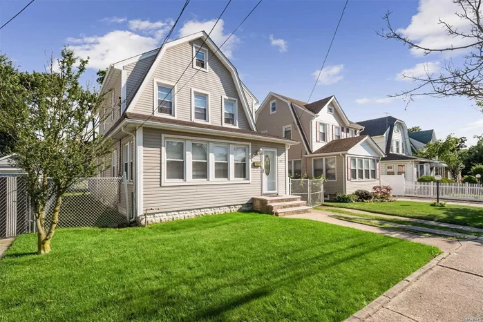 This Immaculate Mid-block Colonial Features Hardwood Floors Throughout 1st and 2nd floors, Cherrywood Kitchen Cabinets, SS Fridge & Stove (2yrs old), Large Living Room w/ Recessed Lighting, Finished Basement (Ceramic Tile Floor Done 2 yrs ago) With Full Bath. Near Town, Shopping, LIRR,