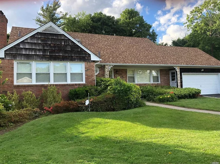 Move Right Into This Lovely Home. Prime Location In Lawrence, On Cul-De-Sac, Features Gas Heat, New CAC, Alarm, IGS, HW Floors, Eik W/2 Sinks, 2 Dishwashers, Double Oven, Wine Refrigerator, Granite Countertops. Walk-In Cedar Closet. Room To Expand, Close To RR, Shopping & Houses Of Worship.