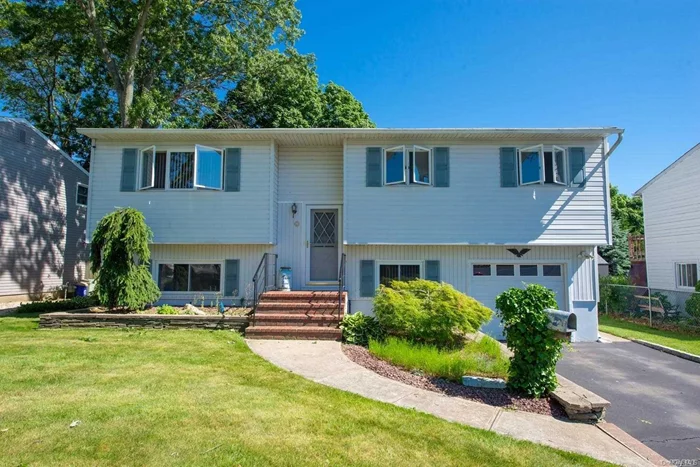 Expanded Hi Ranch Top And Bottom! Lovely, Over sized Eat-In-Kitchen W/ Gas Stove, Sliders To Deck, FDR, LR, Hardwood Floors, Mostly Anderson Windows. Cleanest, Well Taken Care Of Home With Pride Of Ownership. Nicely Finished 1st Level, In-ground Sprinklers , Peerless Boiler, Vinyl Siding, Fenced Property 60x95. Wood Stove Is A Gift (Not Operating)