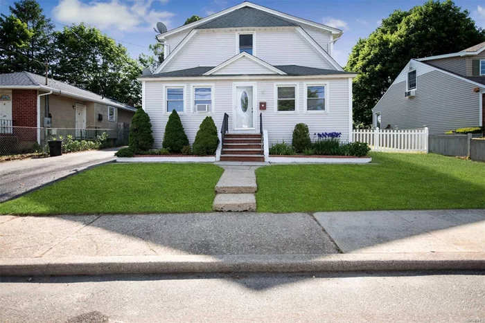 Potential TWO Family Colonial with contemporary detailing, a detached garage, and unrivaled curb appeal sits on well-kept property in a desirable neighborhood. A bright entryway welcomes you to the main floor or the second floor three-bedroom floors with rich hardwood floors, high ceilings, impeccable molding, and designer details throughout. Entertain guests in the large and inviting living/dining room with plenty of openness and a sleek kitchen is complete with new stainless steel appliances