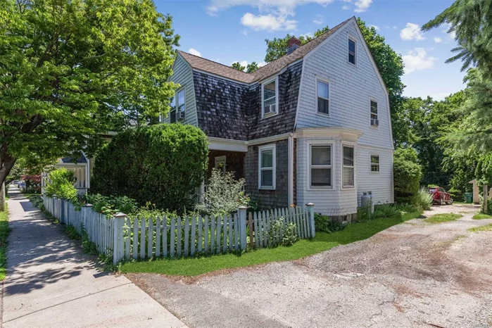 900 feet from the Great Peconic Bay, as the Seagull Flies, lies a magical oasis in the quaint Village of Greenport. The warmth & charm of this elegant 4 bedroom/ 2 full bath Dutch Colonial greet you with high ceilings and wood floors throughout. A peaceful deck overlooking an organic herb garden and cozy front porch are a welcome respite for the soul. Restaurants, shops and galleries are an easy walk along the waterfront, as is transportation to the City.