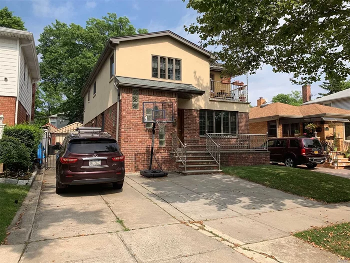 Gorgeous sunny and bright spacious 3 bedroom, 1 full bath, hard wood floors thru out .Installed Ductless Air Conditioners In Each Room, Schools district 26. Parking Spot. Great Location.Back yard , Close to Transportation LIE 495, Bus.  Near All Shopping .