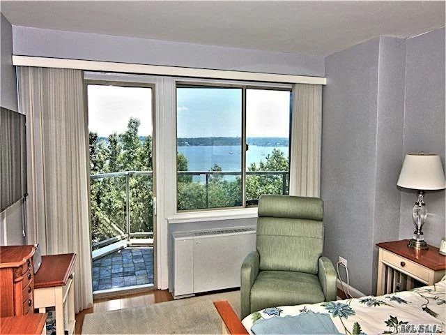 High End Custom Renovated Designer Apt.In A Luxury Bldg. 2 Bedrooms, 2 baths, Wood Floors, 2 Terraces W/ An Amazing Water View.Cac. Hunter Douglas Window treatments, Murphy Bed, 24 Hr.Doorman/Security. State Of Art Gym, .On Site Shopping Arcade W/ Restaurant/Deli/Grocery Store.Beauty Spa, Pool, Gym, Tennis, Party Room.Close To All Shopping & Transportation..Total Maintenance Including Taxes $ 1, 793.66    W/O Garage. Priced to Sell