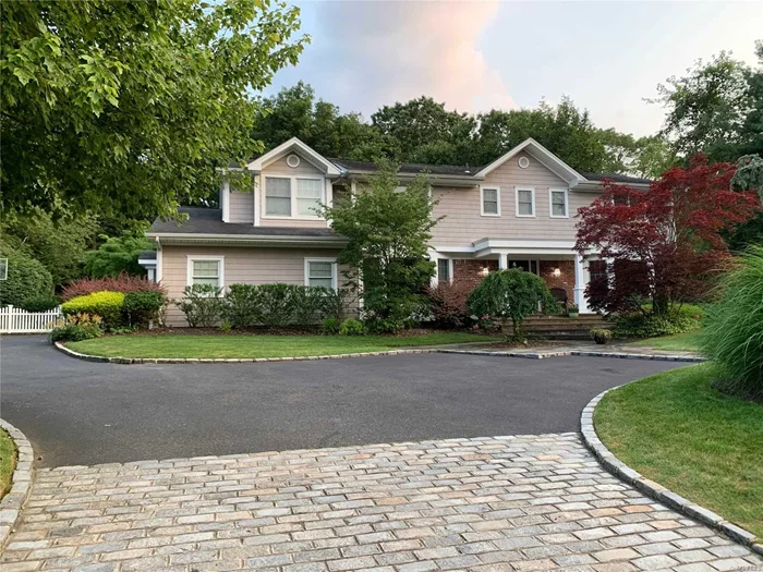 Welcome to this Beautifully Renovated Colonial in the Gates of Woodbury w/open floorplan. Completely gutted, expanded & renovated, this Mid-Block home sits on beautiful Property. It features radiant htd floors in the foyer, EIK & upstairs bthrm. The house is all gas & has a gourmet EIK w/top of the line appl, 3 Ensuites, Lots of storage, pantry, laundry & mudroom on 1st fl. Fin. Bsmt. Bkyd boasts a large stone patio w/fire pit & built-in BBQ. Syosset SD (Walt Whitman