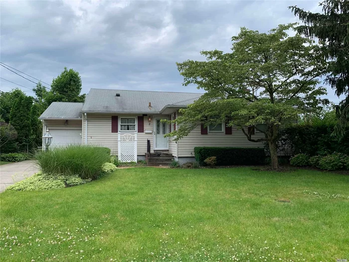 Whole House For Rent. Freshly Painted. This Beautiful House Has 1 Master Bedroom With Bath And 2 Closets. 2 Additional Bedrooms With Full Bath, Large Sun Living Room Slider Door To Rear Deck. Full Finished Basement. 6 Minutes walk to LIRR, restaurants and stores. Syosset schools.