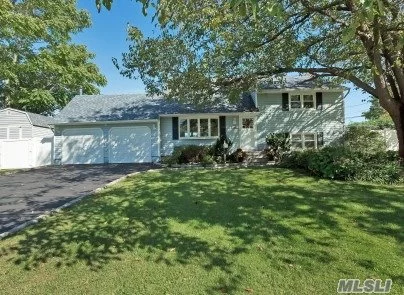 This South of Montauk BOATERS DREAM in Award Winning Islip SD Features Open Airy Floor Plan w/Updtd EIK w/Granite Counters+Under Cabinet Lighting*Newly Renovated Baths*20x20 Family Rm w/Wood Burning Stove*Home Office+Addit&rsquo;l 15x20 Den! Sliding Glass Doors Leads to 30x40 PVC Deck w/Heated AGP &Tiki Bar. Other Amenities incl New Roof*Windows*Elec*Gas Burner*Hot Wtr Htr*IGS. 20x20 Attic Storage, Access to Rentable Boat Slip Up to 34&rsquo; Broad Side*30 Amp Dock Elec * Flood Ins only $600 annually.