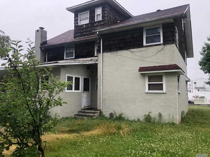 Legal 2 Family......Featuring 5 Bedrooms, 3 Full Bathrooms Conveniently Located In The Heart Of Island Park. 7 Minutes Walk to LIRR. Good Potential Rental Income! Great Investment Property!! Price To Sell! Hurry.....Won&rsquo;t Last Long!