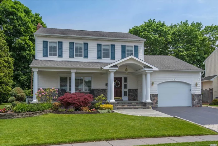 Beautiful 3-Bd, 2.5-Bth Expanded Colonial. Spacious rooms, gleaming wood flrs, Anderson &custom mouldings. Light & bright Maple/Granite eat-in kitchen w/gas cooking, breakfast bar & expanded eating area. Expanded Dining Rm. Expanded Den w/gas fpl & sliders to yard. Expanded master bdrm w/full bath & WIC. Finished basement. Updates incl CAC, baths, W/D, Boiler, HW Heater, 200 Amp, front porch, roof, siding & more. Private yard w/paver patio. Taxes Grieved-6.6% reduction as of 10/2019.