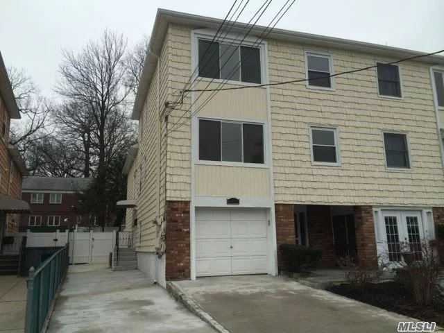 Brand New Large triplex.W/Garage Near Bay Terrace Shopping Center Area of Bayside. Apt. newly renovated. 3 Levels Living Space Over 1800 SF.Hard wood floors throughout 3 Br2, 5 Baths , Office. Easy Access To All Transportation Lirr To Penn Express Bus To Manhattan.Fenced Back Yard .Great location.Walk To Fort Totten Park by the Water.