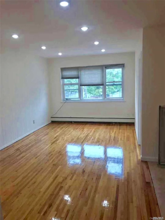 Sunny and Nice Newly Renovated 3 Bedrooms Apartment in the Heart of Bayside. Large Living Room, Updated Kitchen and Bath, Hardwood Floor, Excellent School District #26(Ps46, Jhs74, Cardozo High School), Heating is included. Close to All. Must See.