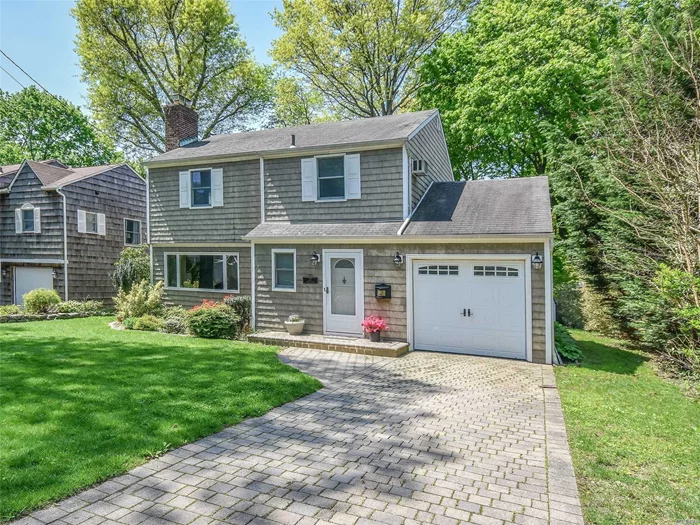 Taxes successfully grieved for Oct 2019! Lovely Manhasset Bay Estates Colonial features 3 bedrooms and 2.5 baths. Spacious living room with stone fireplace flows easily to formal dining room. Family Room or 4th Bedroom on first floor w/full bath and separate entrance. Sunny EIK with pantry opens to deck and private yard. Basement playroom with laundry. Beach rights with dues to enjoy sunsets. Water filtration, radiant heat.