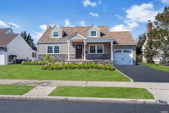 99% New Construction, expanded Cape with open floor plan, kitchen with large island, sliders to paved patio, beautiful private yard. Ductless heat/air, hardwood floors throughout, fully finished basement. East Meadow Schools.