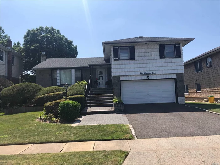 Spacious 3BR Home On A Quiet Tree Lined Residential Street, Features Central Air Conditioning, High Hats, Eik W/SS Appliances, IGS, 200 Amp Service, 2 Car Garage, Finished Basement, New Front Steps.