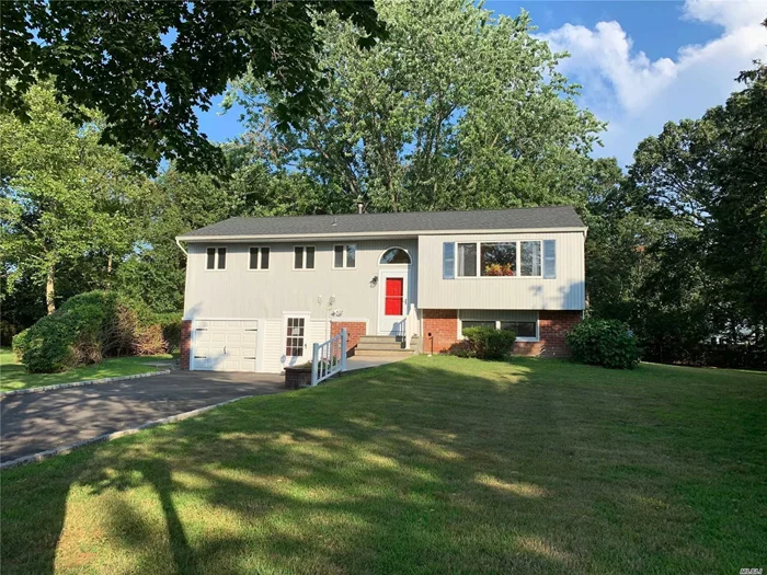 Prime East Northport Hi-Ranch on A Quite Cul-de-sac Situated on over a Half Acre Landscaped Lot with a Beautiful Spacious Backyard in the Commack School District. This Well Appointed Home Features Hardwood Floors, Granite Countertop, EIK with Tile Floor, A FDR, A LG Bright Living Rm and Updated Bathrooms, the Master Bedroom is en-suite.The 1st Fl/Lower Level Has a Large Family Rm w/Several Additional Home Office or Multipurpose Rooms (soundproofed/pervious music studio) with Separate Entrance.