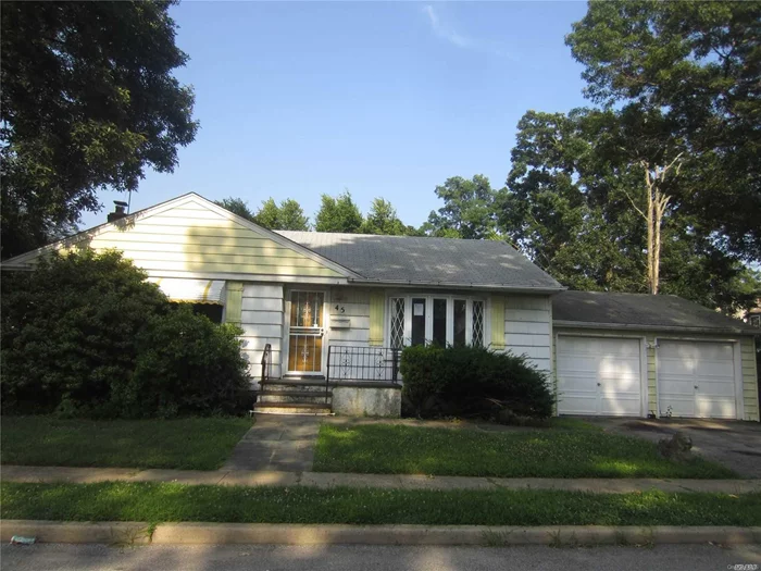 Affordable and charming, Ranch style home in need of a designers touch. This home features an attached, 2 car garage, 3 bedrooms, full basement and plenty of storage.