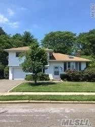 Beautiful 3 Bedrooms 2 Full Baths In Jericho School District. Updated Bath, Hardwood Floors, Den, Deck, Finished Basement. Move-In Condition.