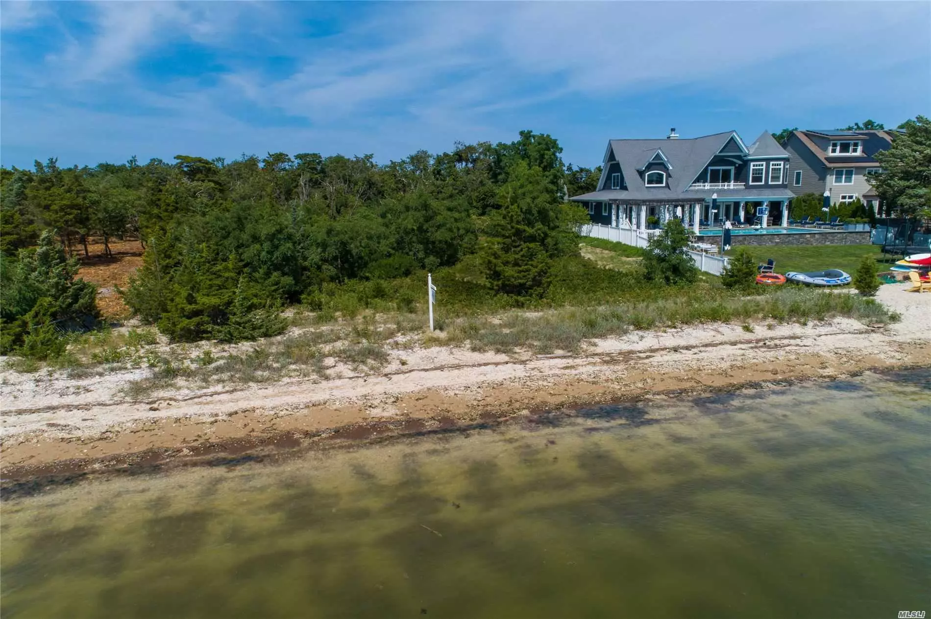 Build your Dream Home.One of the Most Beautiful Beaches on The North shore. The Hampton Life is Right Here. Waterfront Parcel One Acre. Gorgeous Beach Front, Mooring and Beach.Quiet and Peaceful Quintessential Beach Life in Asharoken . Private Village and Police. Enjoy the Ambiance of Northport Village. Plans are Available Upon Request. SD#4