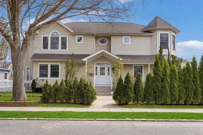 Beautifully redone young colonial with soaring entry, warm tones, and generous living areas, only 2.5 blocks from the train. Master Bed/ Bath suite with vaulted ceiling, gas cooking, full basement w/ high ceilings and entertainer&rsquo;s patio. Close to parks, school, town, and train. Move right in!