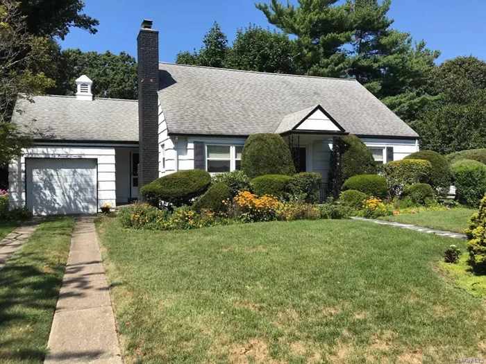 Picturesque Cape on Private, Manicured Lot. Add Your Personal Touches to Make This Yours. Newer Roof, Windows and Hot Water Tank.