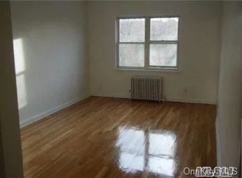 Large two bedroom apartment with big living room and large kitchen with eat in area . Newly updated and includes a driveway and garage. Close to LIRR Shopping and Parkways. Heat, hot-water and cooking gas included.