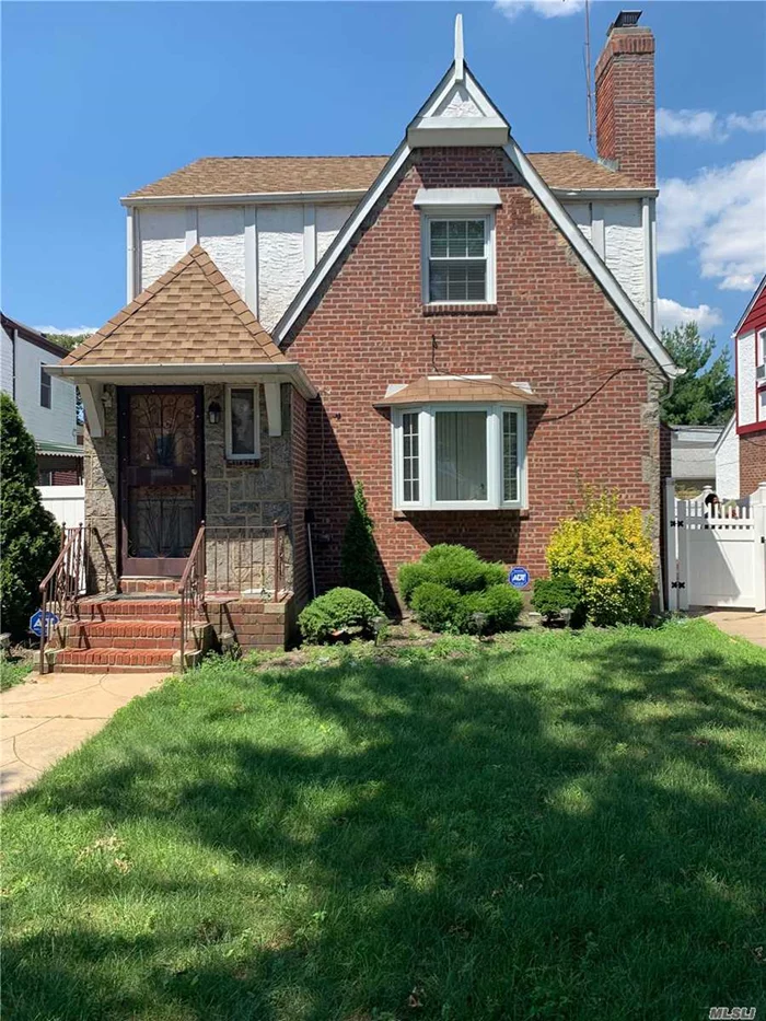 Property has hard wood floors, working fire place, back patio & a walk up attic. Basement has 1 bedroom apartment with separate entrance with full bath and stand up shower.