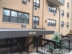 excellent condition, corner unit , window facing south 3 new A/C  garage parking available , near transportation, walk to LIRR
