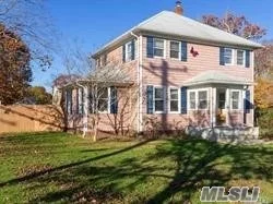 Charming 3 Bdrm Colonial located on beautiful 1/2 acre, Well Kept, Updated, Hrdwd Flrs, Walk in Closet in Master Bdrm, Spacious Open Floor Plan, Pull Down Attic Stairs, Basement, Detached Garage, Fence yard, Close to LIRR, in Sachem SD