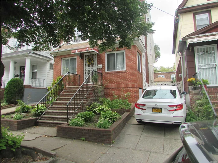 Diamond Condition House For Rent In The Heart Of Elmhurst. Convenience To Everything, Shopping Mall,  M & R Trains. Q58, Q59 & Q60. 1/2 Block To Queens blvd. Included Garage