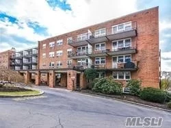 Large 2 BedroomCo-op with 2 Full Baths, Living Room, Dining Room, Kitchen, Terrace, Lots of Closets, Laundry Room on each Floor, Community Pool.