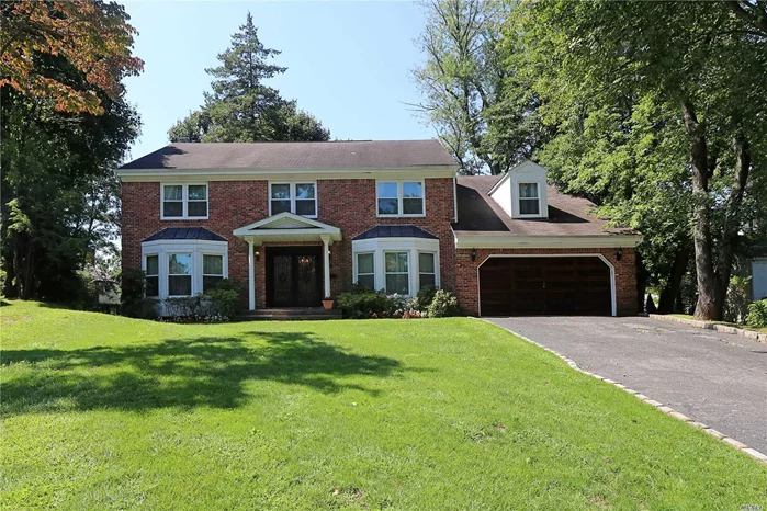 Beautiful Huge Brick C/H Colonial Features Foyer, Lr, Fdr, Den, Eik, Maids Rm, Full Bath, Powder Rm, Laundry, & 2 Car Garage On 1st Level. Upstairs Has Master Suit W/ Walk-In Closets And Huge Bathroom + 4 Additional Bedrooms W/ 2 Full Bath. Full Basement, Gas Heat, Cac, Sprinklers, Alarm & Generator. Large Flat Back-Yard, Walk To Park, School & Worship.