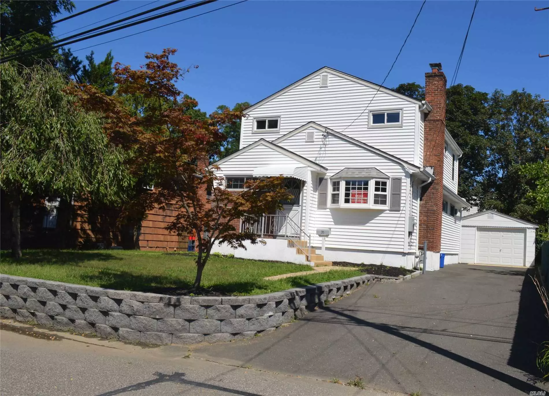 Large home. Recently refinished wood floors & painted inside and out. Bathrooms and kitchen are functional but do need updating. Located on the west end of town. Short Distance to beautiful beaches.