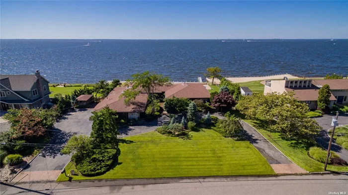 Location, location, location ! Sprawling Bayfront Ranch In The Moorings Approx 4000 Sq Ft Ranch W/ New Bulkhead & Jet Ski Lift. New In Ground Pool. Located In Luxury Gated Community, With Tennis And Marina. Views, Views, Views...Situated On The Great South Bay.