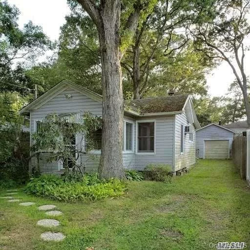 Adorable Cottage In Need Of TLC- Looking To Be Home Sweet Home To The New Owner. Call For Details.