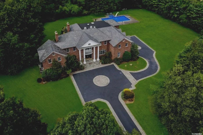 A Brick Colonial Masterpiece That Sits On 3.1 Acres. With Gated Entry & In Jericho Schools,  Is A Towering Vision Of Stately Leisure! The 20&rsquo; High Entry Foyer Features Radiant Heated Floors in Foyer, Den, and Mstr Bth . 2 Half Baths & Massive Eat-In Kitchen W/Viking & Sub-Zero Appliances, The Grand Backyard Space Is Complete With Brick Patio, Impeccable Lawn, And Sizable Pool & Jacuzzi! Courtyard Driveway, 3-Car Garage. 12&rsquo; High Ceilings In The Basement Provide Unparalleled Accommodation!