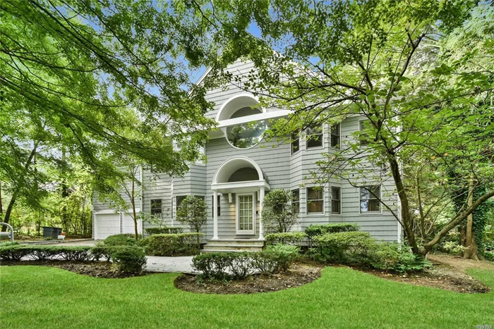 Spacious, Sun Drenched, and Sky Lit Contemporary C/H Colonial in The Village Of Great Neck Estates. A 30 Ft High Entry Foyer is adjacent to a Formal Living Room and Banquet Dining Room with Window Seat. The 17 Ft High Den has a Custom Built-In and Fireplace. The Eat-In-Kitchen leads to a Huge Blue Stone Patio Overlooking a Private Landscaped Yard. A Powder Room and Laundry Complete the First Floor. The Master Suite has Cathedral Ceilings and Spa Bath. There are 3 additional BR&rsquo;s and bath.